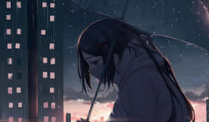 A Lonely Figure Sits In The Crowded Street, Contemplating The World Around Them. Wallpaper