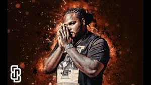 A Man With A Black Shirt And A Black Background Wallpaper