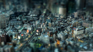 A Miniature Detailed Cityscape Of 2560x1440 Wallpaper