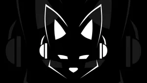 A Mischievous Fox Jumping Against A Contrasting Black Background. Wallpaper