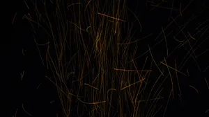 A Modern Black And Gold Desktop Computer Setup With Black Monitor Stand Wallpaper