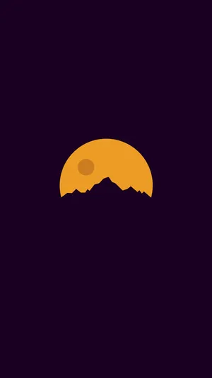 A Mountain Silhouette With A Sunset Behind It Wallpaper