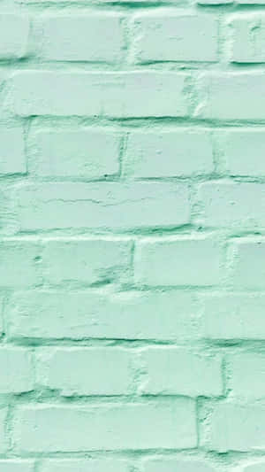 A Pastel Mint Green Background That's Perfect For Any Design Project. Wallpaper