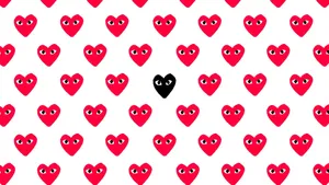 A Pattern Of Red Hearts With Black Eyes Wallpaper