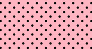 A Pink Background With Black Dots Wallpaper