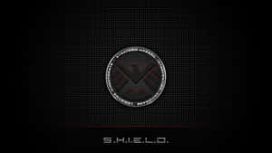 A Powerful Shield On A Regal Red Background Wallpaper