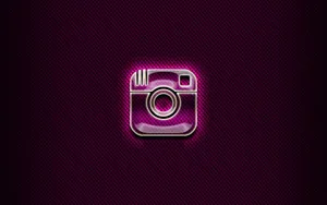 A Purple Instagram Logo On A Dark Background Wallpaper