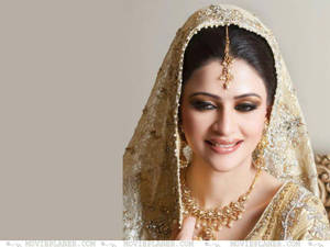 A Radiant Bride In A Beautiful Wedding Gown Wallpaper