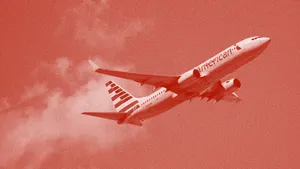 A Red Airplane Flying In The Sky Wallpaper
