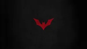 A Red Logo On A Black Background Wallpaper