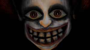 A Scary Clown Face With A Black Background Wallpaper