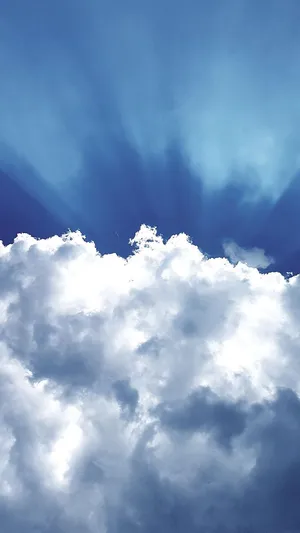 A Shimmering Light Blue Phone Against A Sky Backdrop Wallpaper