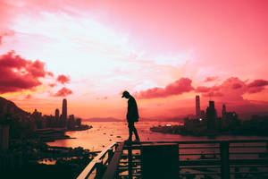 A Silhouette Of A Person Enjoying A Moment Of Contemplation Wallpaper