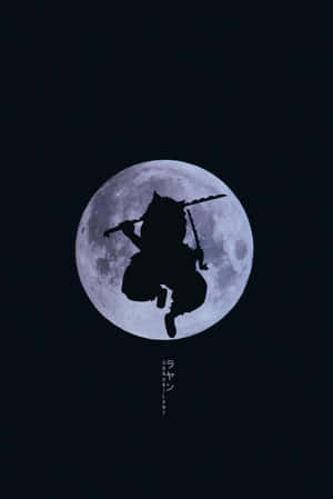 A Silhouette Of A Samurai In Front Of The Moon Wallpaper