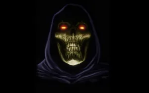A Skull With Glowing Eyes In The Dark Wallpaper