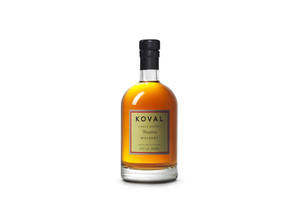 A Sophisticated Bottle Of Koval Bourbon Whiskey Wallpaper