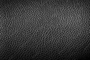 A Sophisticated Look With Black Leather Wallpaper