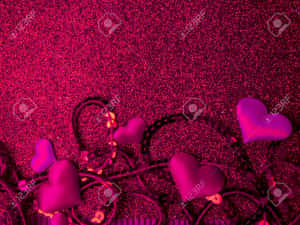 A Sparkling Pink Heart Shines Hope In The Darkness Wallpaper