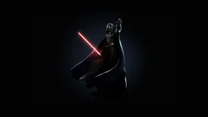 A Star Wars Lightsaber In Hand, Ready For A Lightsaber Duel Wallpaper