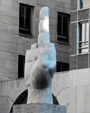 A Statue Of A Hand Wallpaper