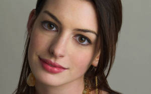 A Striking Portrait Of Anne Hathaway Wallpaper
