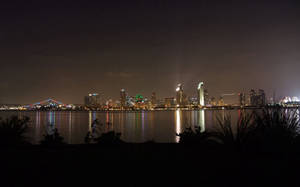 A Stunning Sunset Over Crystal Clear Waters Wallpaper