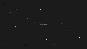 A Stylized Laptop With An Eye-catching Star Pattern Wallpaper