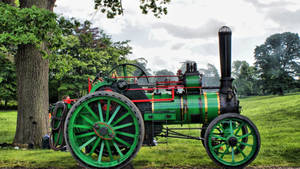 A Traditional Steam Tractor In Its Glory Wallpaper