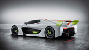 A White And Green Racing Car In A Dark Room Wallpaper