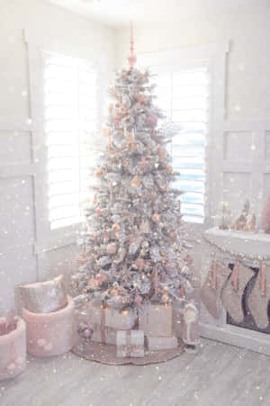 A White And Pink Christmas Tree In A Room Wallpaper