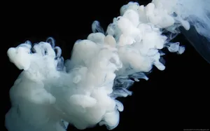 A White Smoke Is Floating In The Air Wallpaper