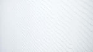 A White Wall With A Pattern Of Waves Wallpaper
