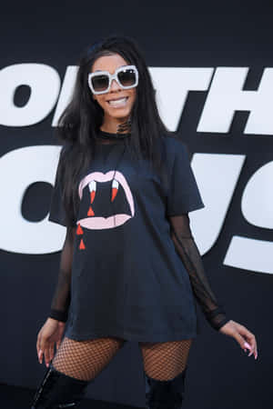 A Woman In A Black Shirt And Thigh High Boots Poses For A Photo Wallpaper