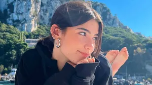 A Woman Is Posing For A Photo On A Boat Wallpaper