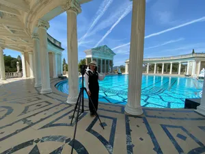 A Woman Taking Her Picture At Hearst Castle's Pool Wallpaper