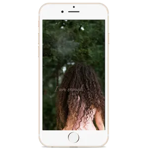 A Woman With Curly Hair Is Standing In Front Of A Tree Wallpaper