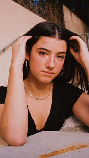 A Woman With Long Hair Wallpaper