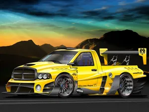 A Yellow Truck On A Road Wallpaper