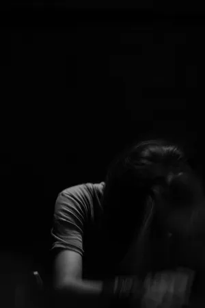 A Young Woman Stares Forlornly Into The Distance, Feeling Overwhelmed And Alone. Wallpaper