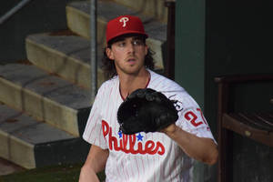 Aaron Nola Holding Up Mitt Wallpaper