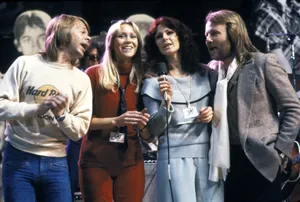 Abba Singing On Stage Wallpaper