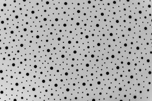 Abstract Artwork Of Black Dots On A White Canvas Wallpaper