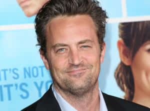 Actor Matthew Perry Looking Towards The Camera Wallpaper