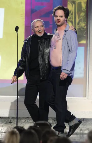 Actor Rainn Wilson Striking A Pose. Wallpaper