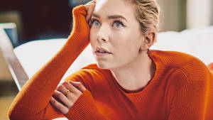 Actress Vanessa Kirby In Orange Wallpaper