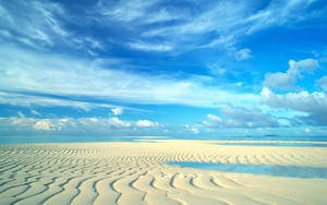 Add An Element Of Professionalism To Your Workspace With This Minimalist Blue Aesthetic Desktop Wallpaper. Wallpaper