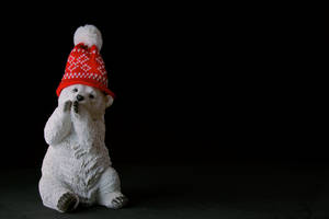 Adorable Bear Cub Makes A Festive Statement Wallpaper