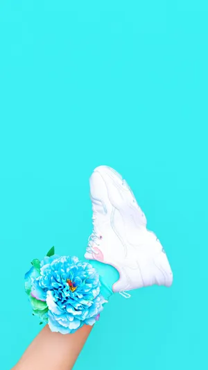 Adorable Blue Butterfly On A Vibrant Purple Flower Wallpaper