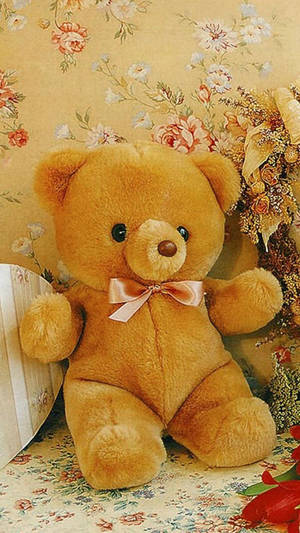 Adorable Little Brown Teddy Bear Wallpaper