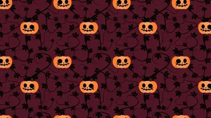 Adorable Smiling Jack-o'-lantern In A Fall Harvest Scene Wallpaper